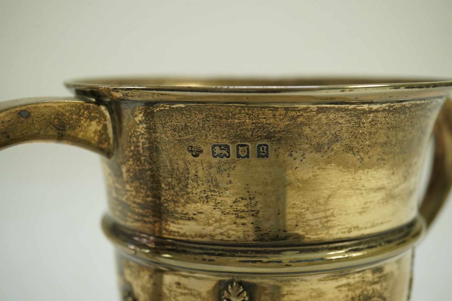 A George V silver two handled presentation trophy cup by The Goldsmiths & Silversmiths Co Ltd, with engraved horse racing inscription relating to 'The Arab Cup Bideford Races'